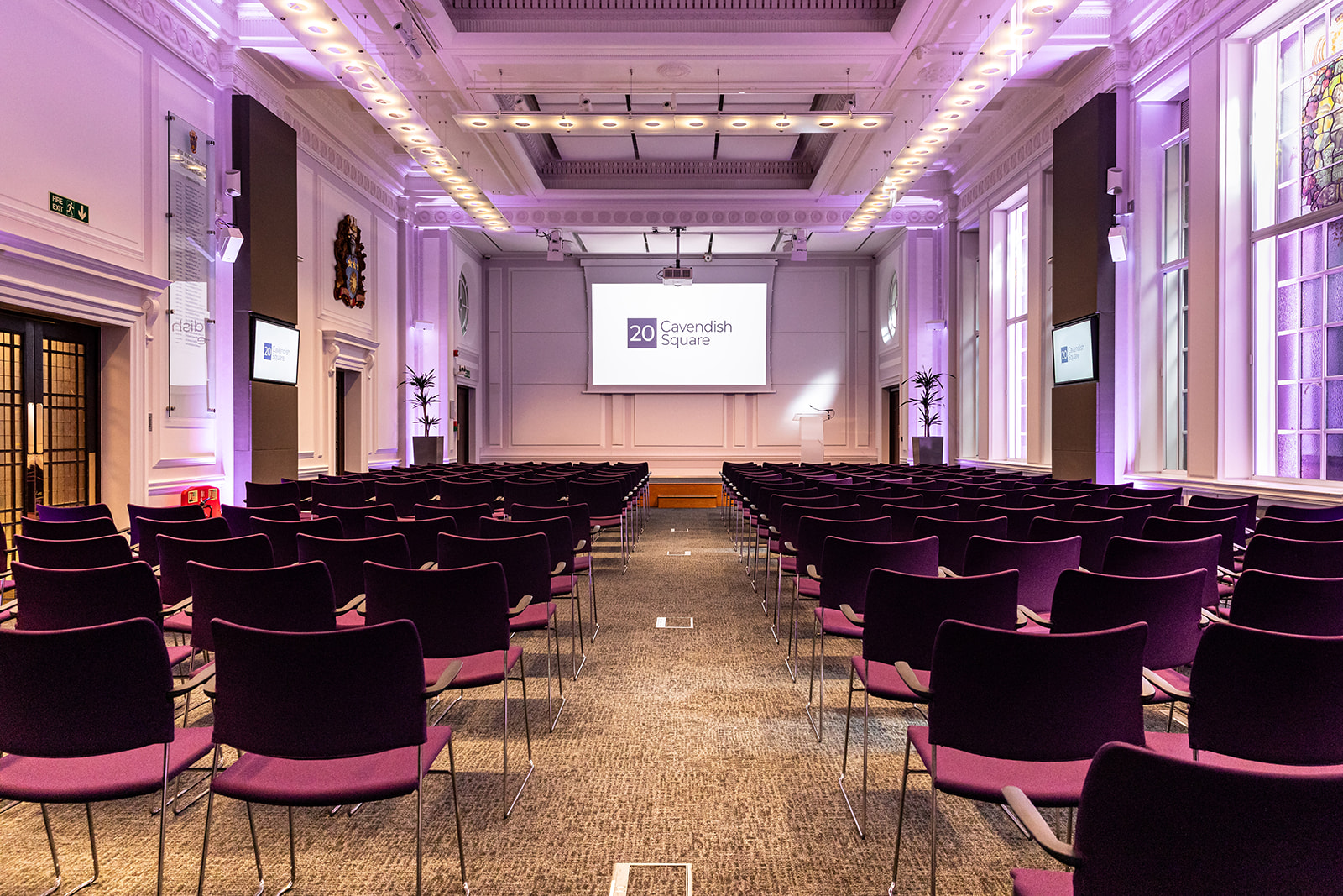 Modern venues near major stations london with boardroom table and presentation screen