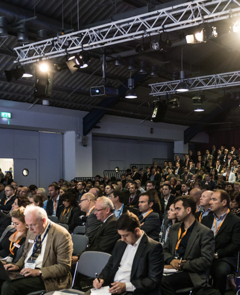 Modern lecture & talk venues in london with boardroom table and presentation screen