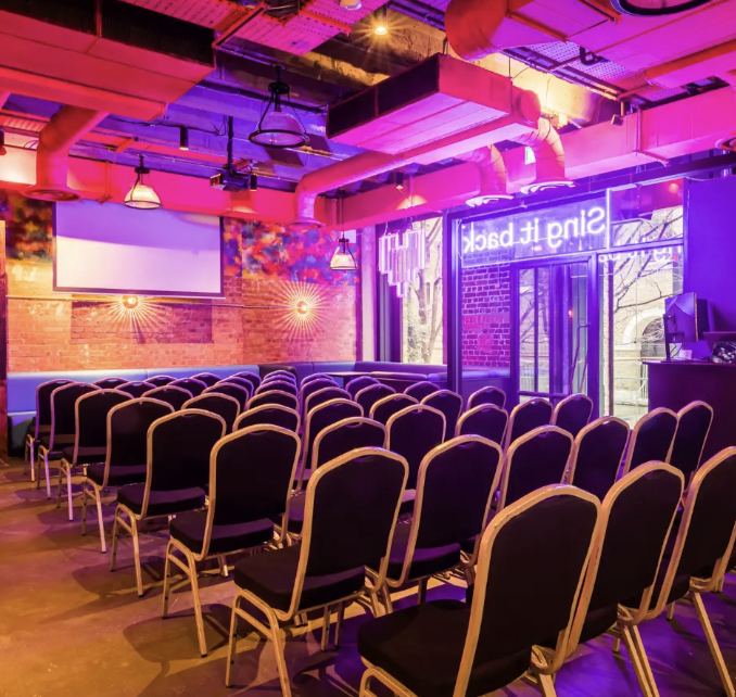 Modern private bar hire in london with boardroom table and presentation screen