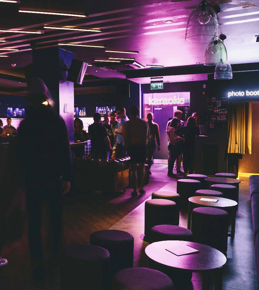 Modern karaoke party venues in london with boardroom table and presentation screen