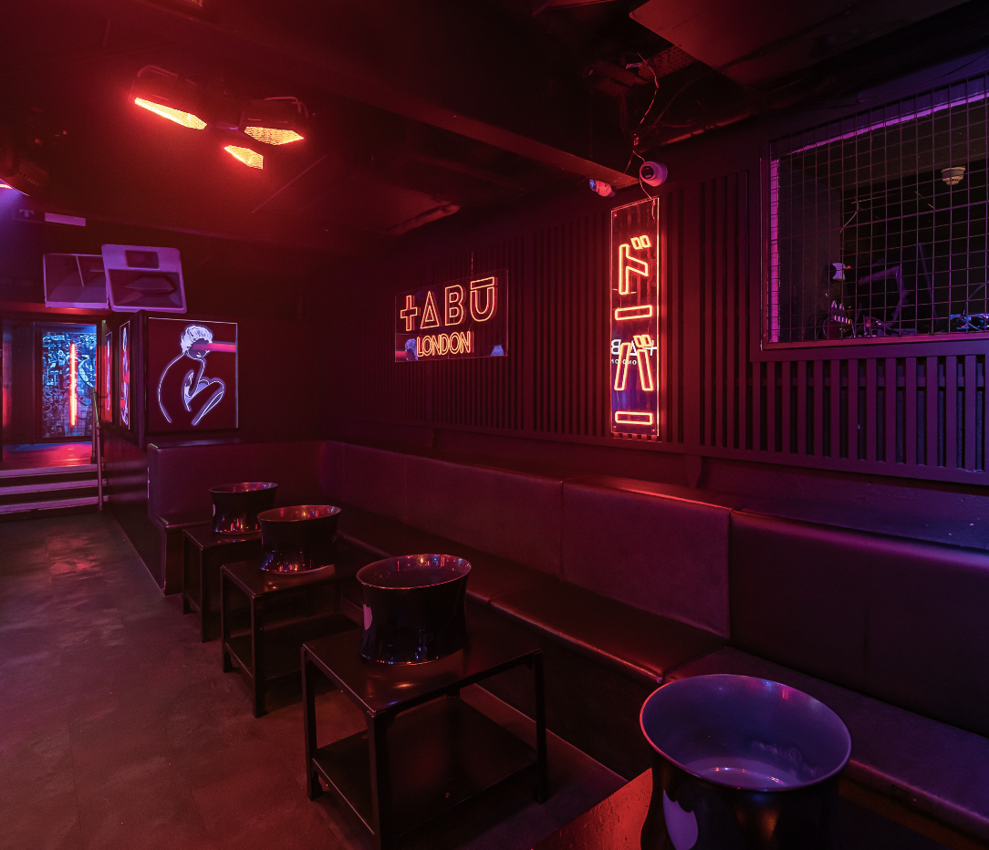 Modern indian event venues in london with boardroom table and presentation screen