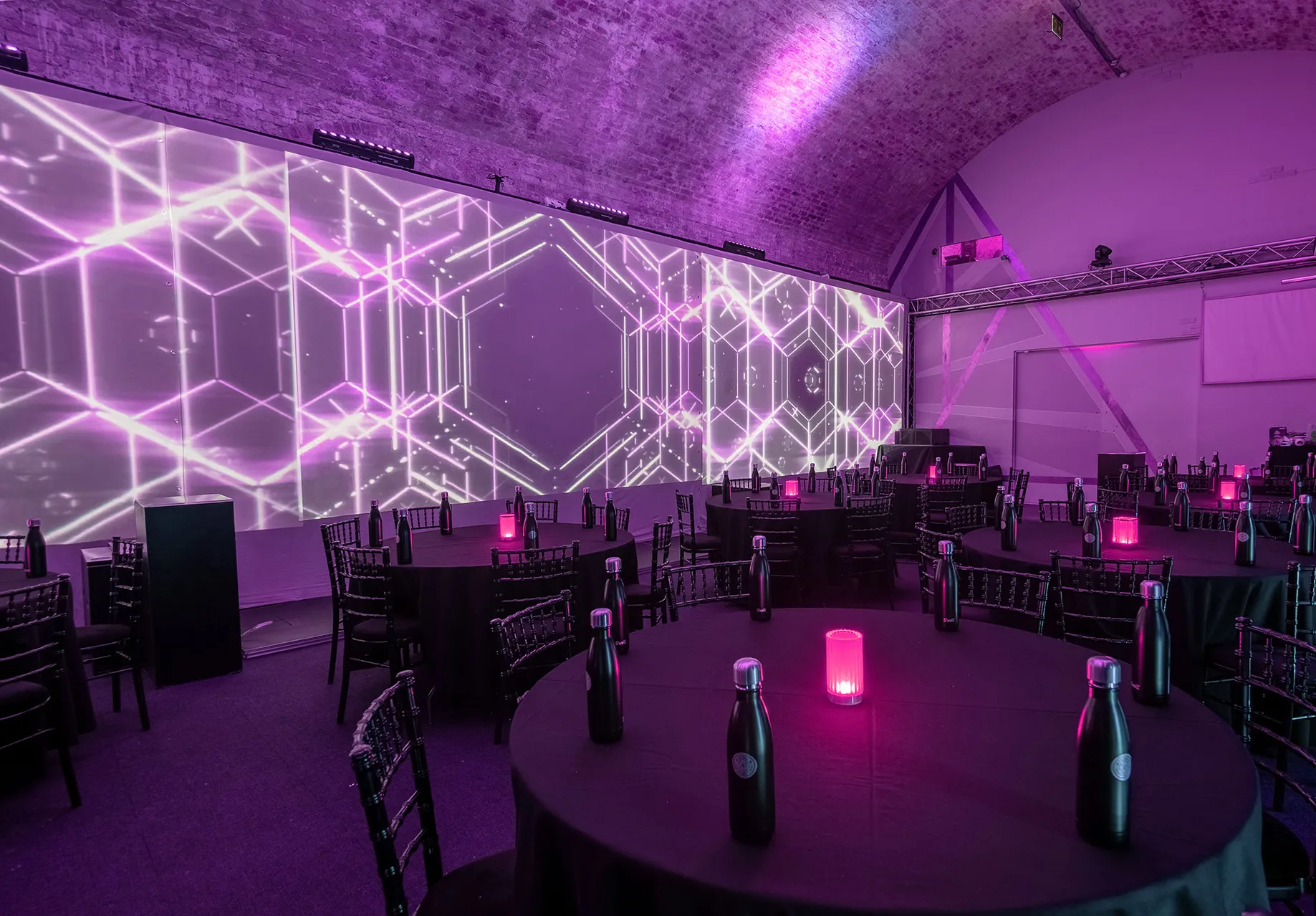 Modern  company party venues in london with boardroom table and presentation screen