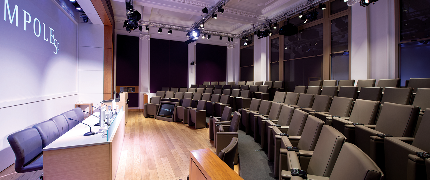 Modern exhibition venues london with boardroom table and presentation screen