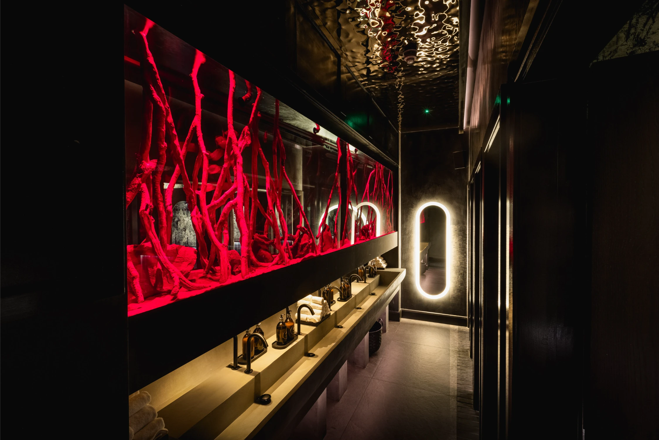 Modern team dinner venues london with boardroom table and presentation screen