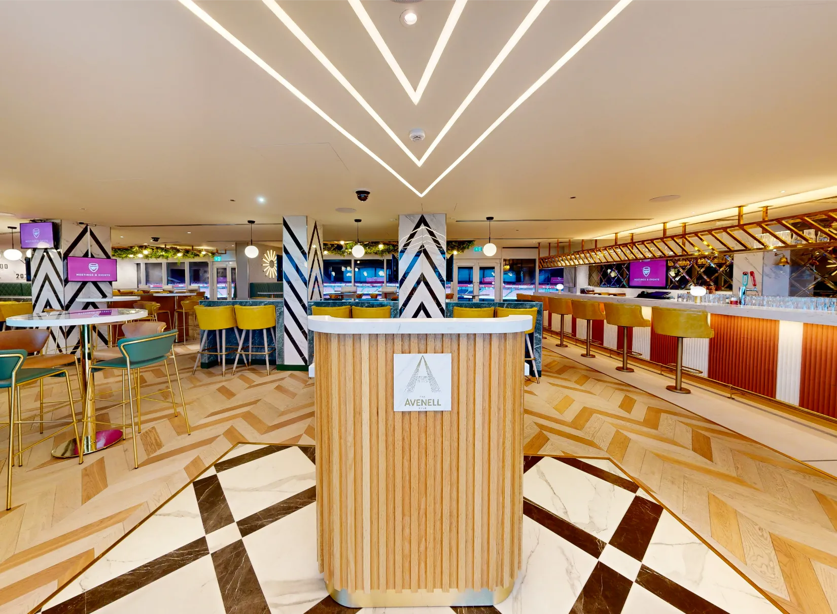 Modern venues allowing external catering central london with boardroom table and presentation screen