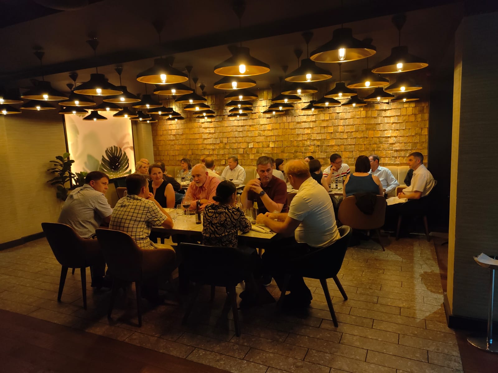 Modern venues for 50 people london with boardroom table and presentation screen