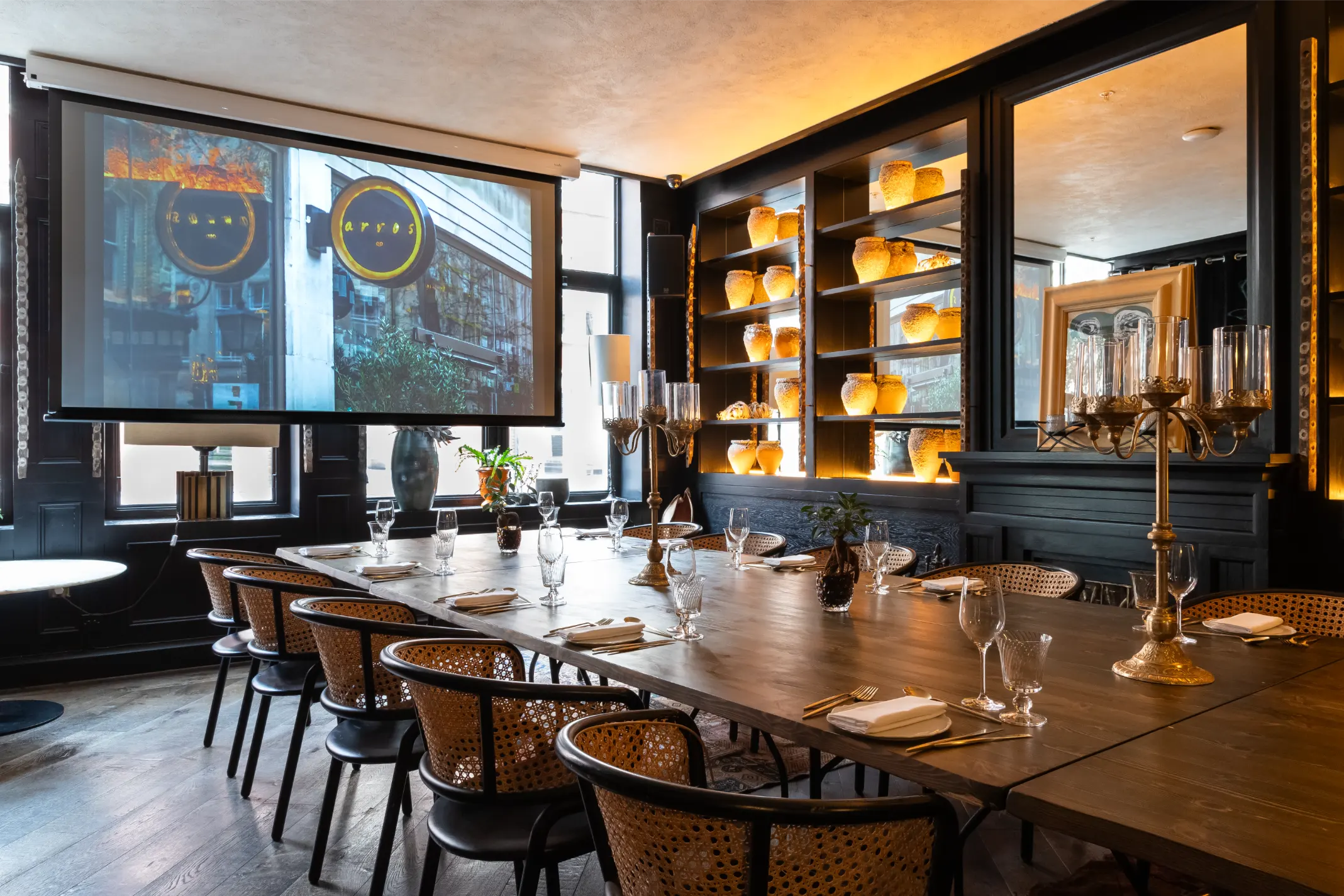 Modern restaurants with private rooms london with boardroom table and presentation screen