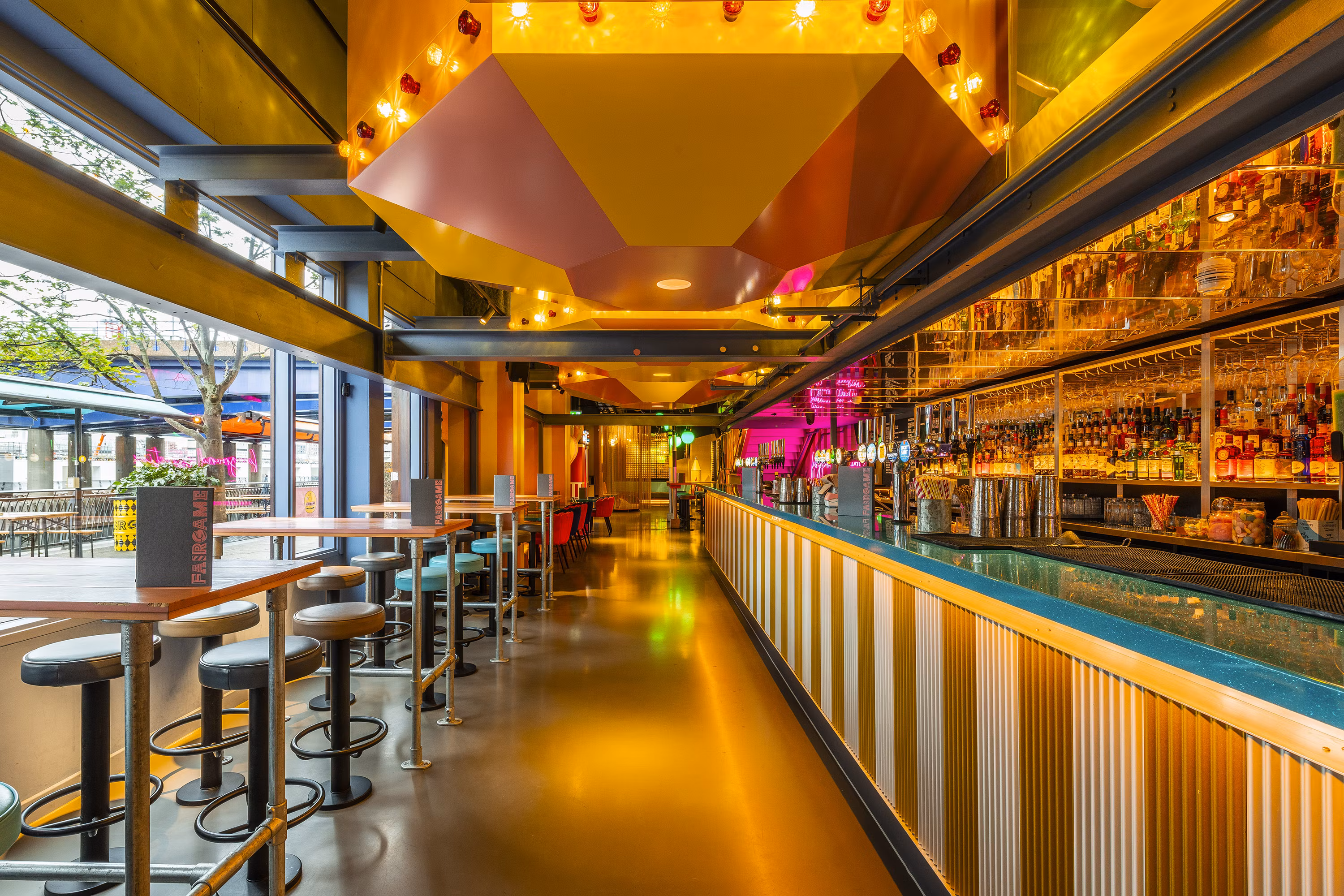 Modern team building venues london with boardroom table and presentation screen