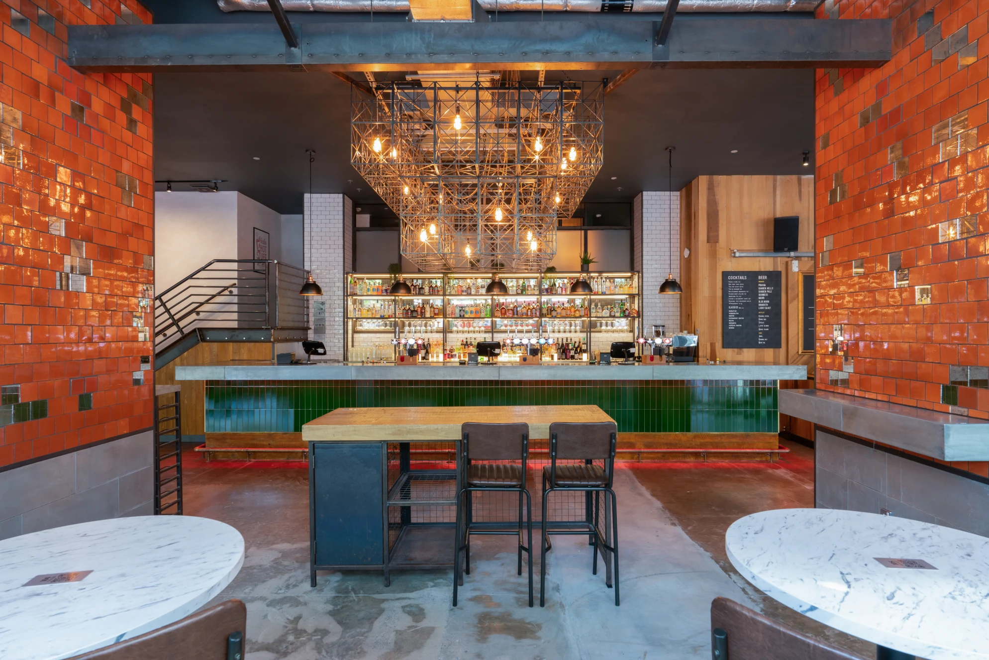 Modern venues for 200 people in london with boardroom table and presentation screen