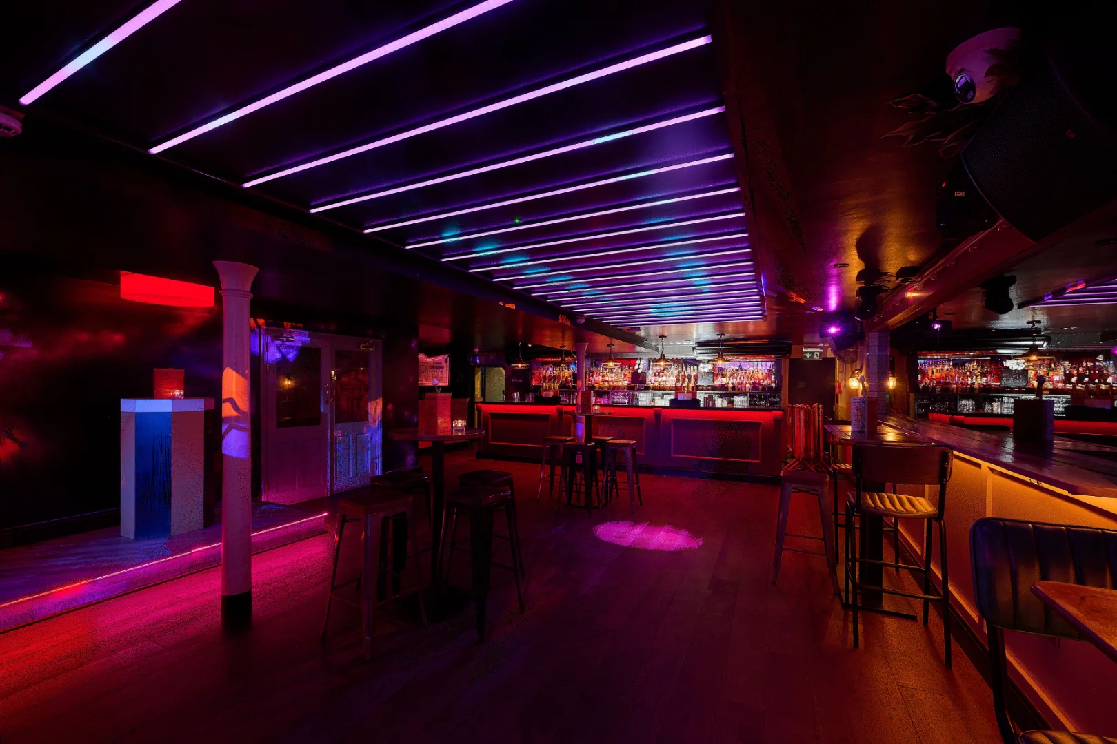 Modern end of year party venues london with boardroom table and presentation screen