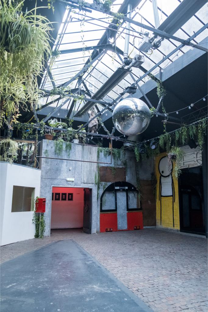 Modern warehouse venues london with boardroom table and presentation screen