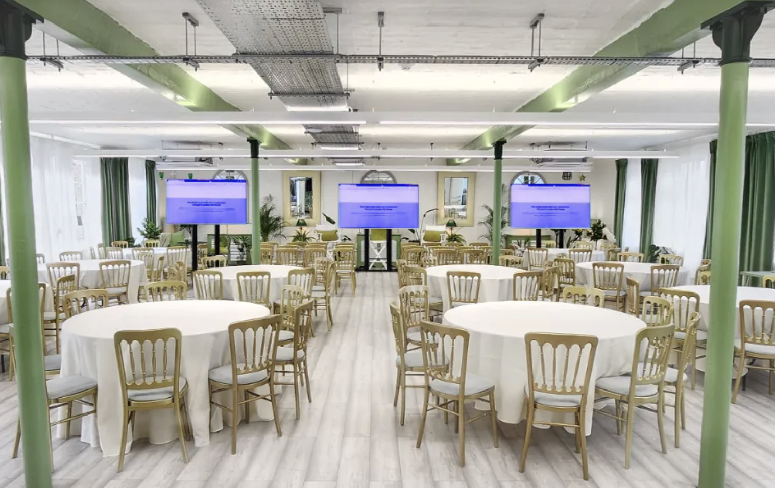 Modern theatre style venues with boardroom table and presentation screen